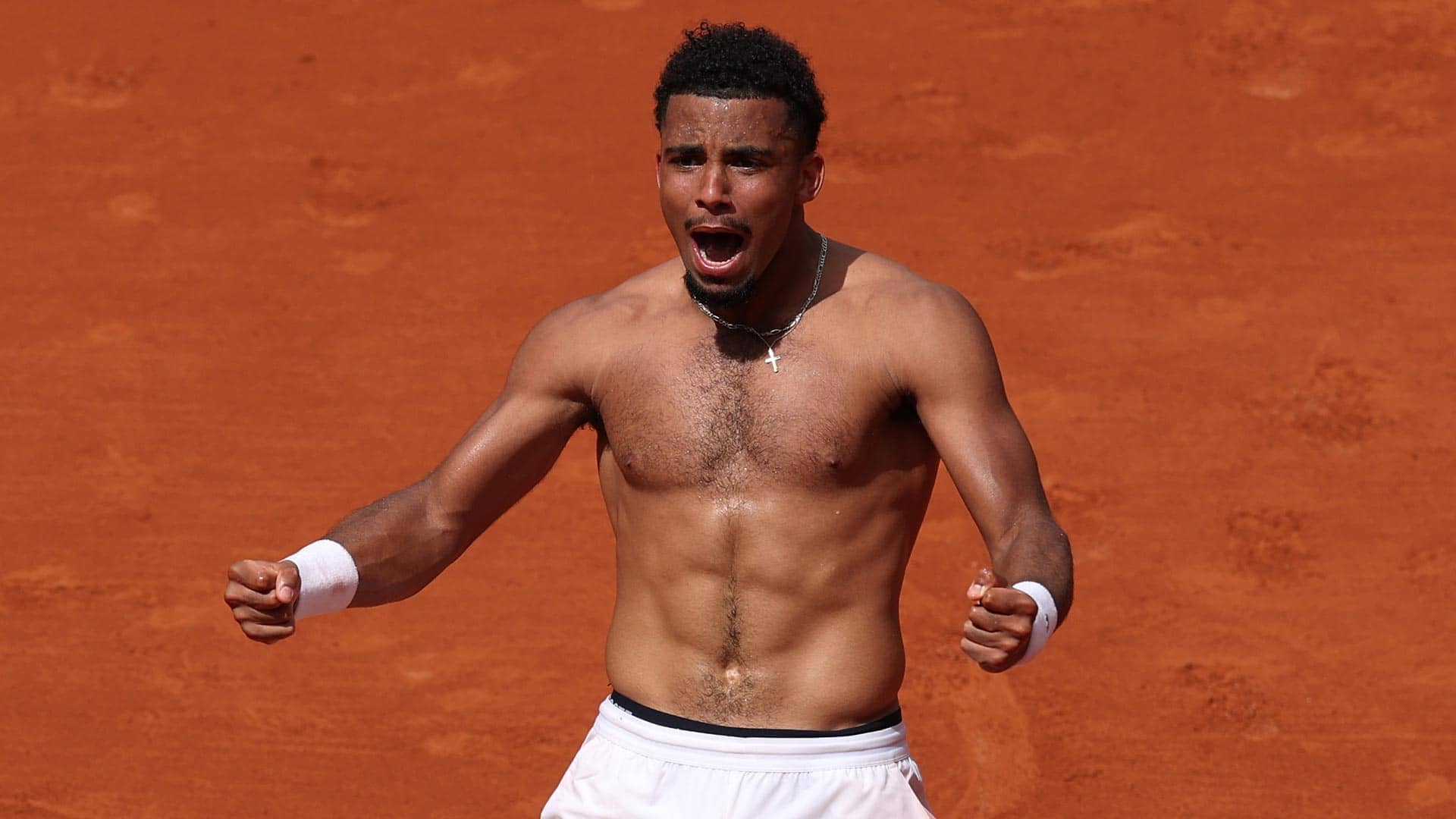 Arthur Fils celebrates reaching the third round in Paris for the first time.