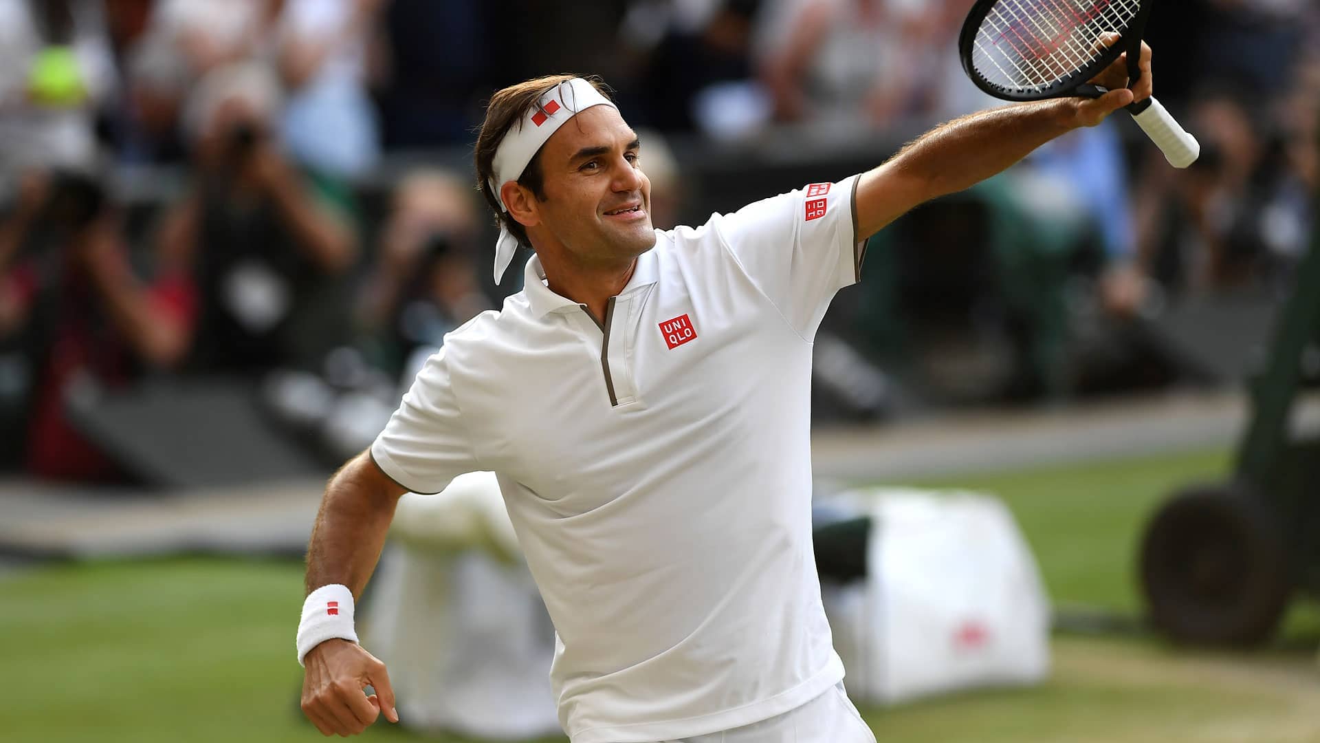 Roger Federer celebrates beating Rafael Nadal on Friday at Wimbledon, where he's attempting to capture a record-extending ninth trophy.