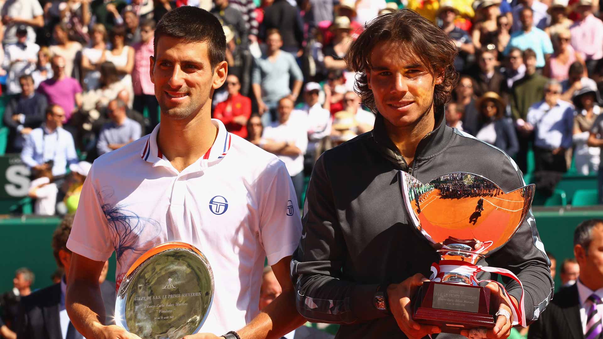 Djokovic and Nadal at the 2012 Monte-Carlo trophy ceremony.