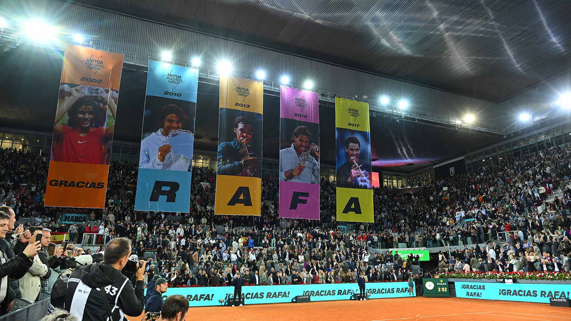 Five banners marking <a href='https://www.atptour.com/en/players/rafael-nadal/n409/overview'>Rafael Nadal</a>'s five titles in Madrid.