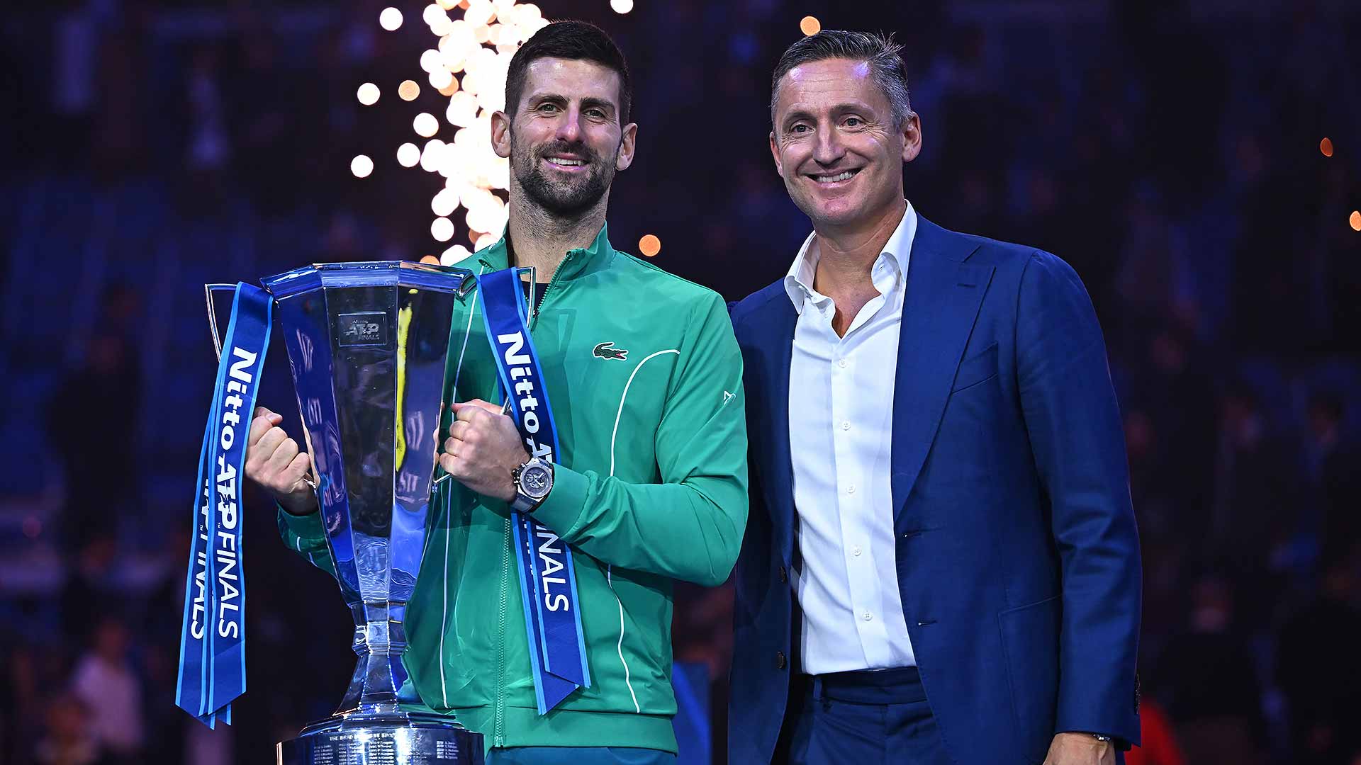 Novak Djokovic celebrates his seventh Nitto ATP Finals title with ATP Chairman Andrea Gaudenzi.