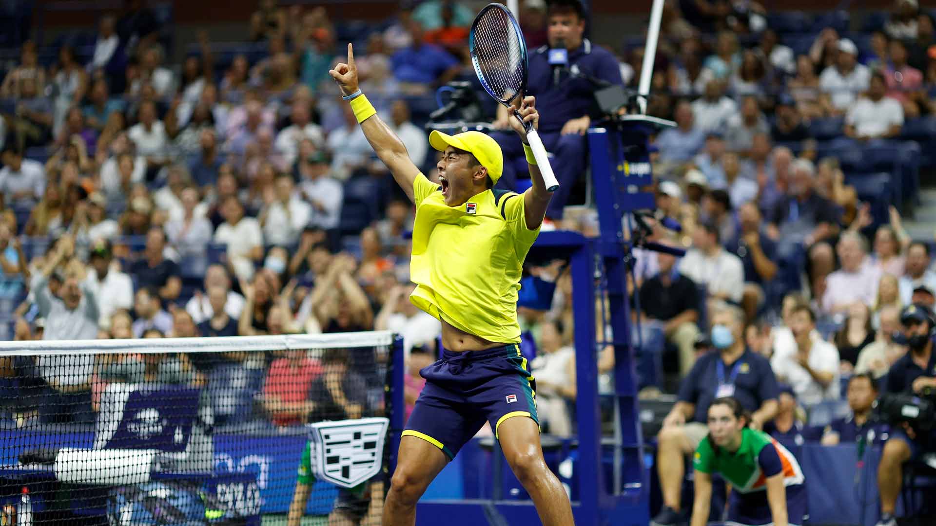 Rinky Hijikata pumps up the crowd at Arthur Ashe Stadium.