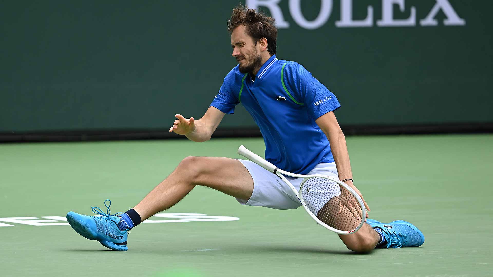 Daniil Medvedev takes a tumble during his three-set win over Alexander Zverev.