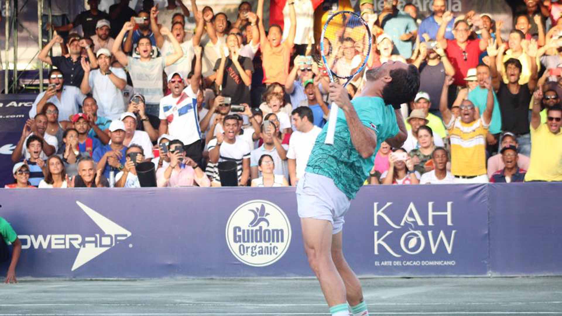 An exuberant Victor Estrella Burgos celebrates in front of the home fans in Santo Domingo.
