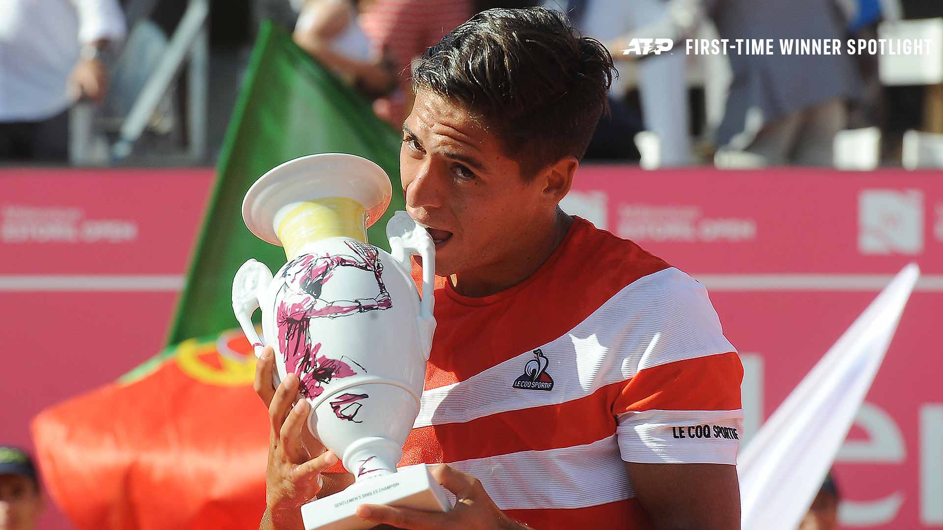 Sebastian Baez celebrates his first ATP Tour title in Estoril.