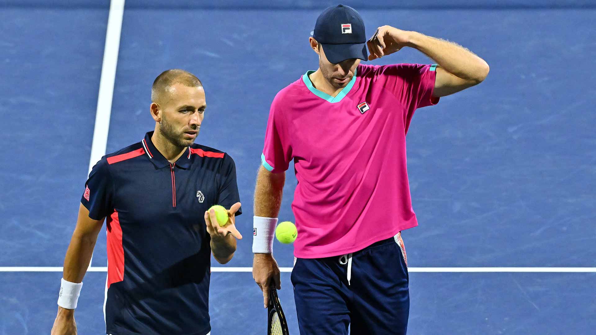 Daniel Evans and John Peers defeat Andre Gorannson and Ben McLachlan on Monday in Tokyo.