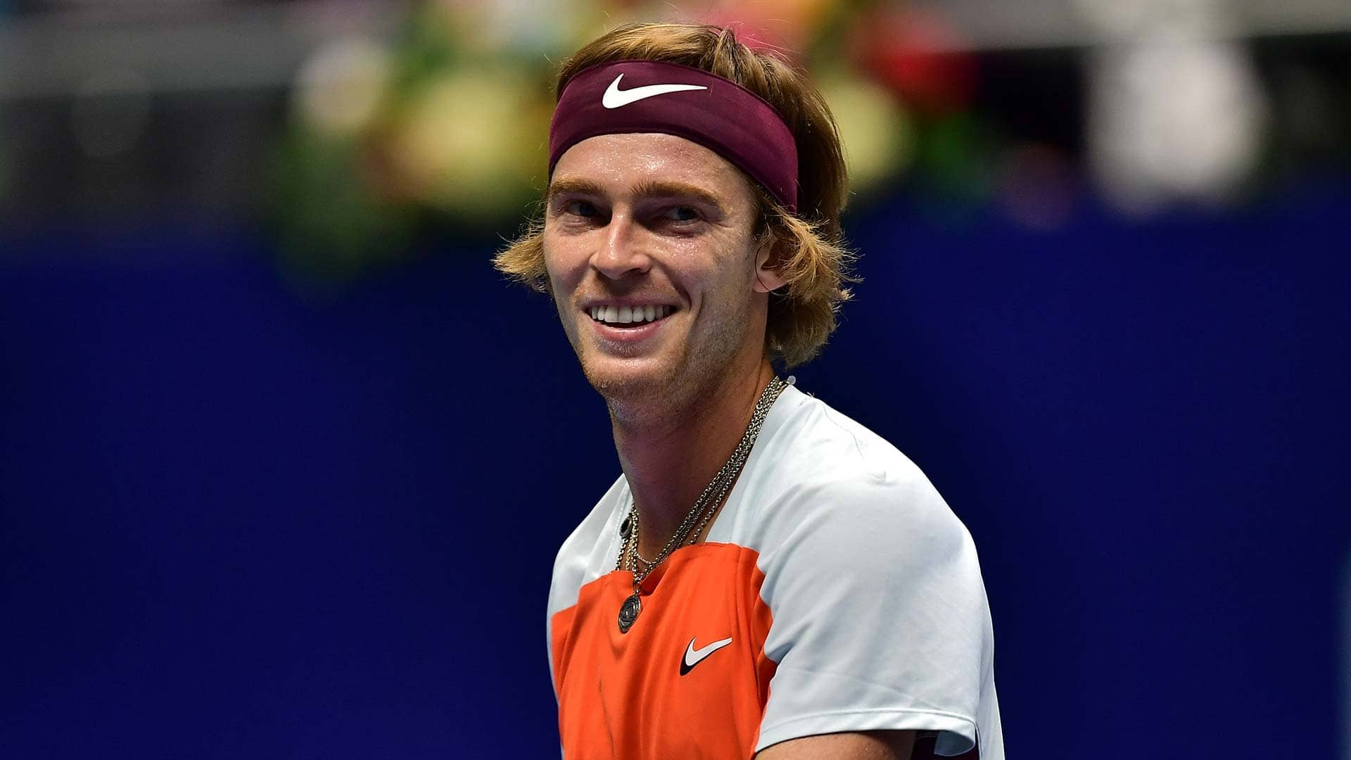 Andrey Rublev smiles during his first-round match on Monday in Astana.