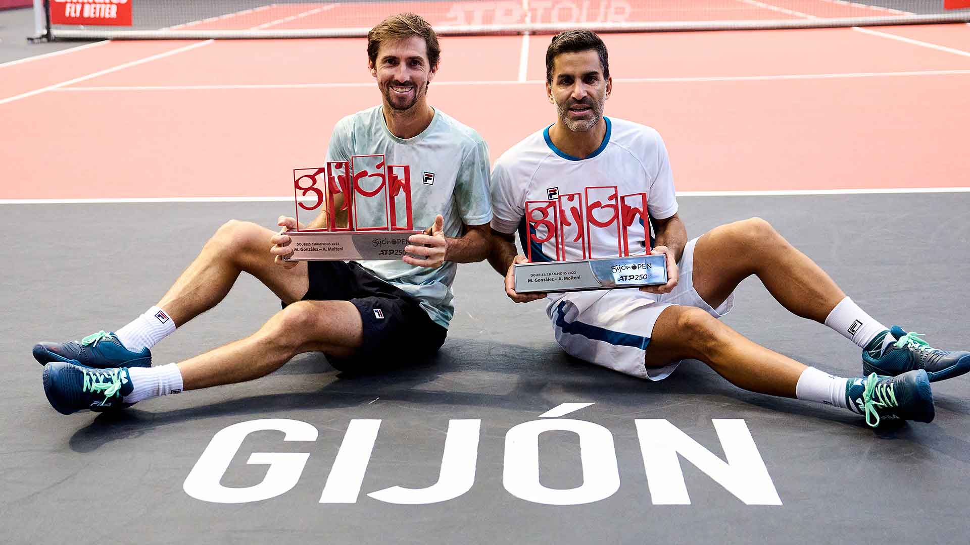 Andres Molteni and Maximo Gonzalez celebrate winning the title in Gijon on Sunday.
