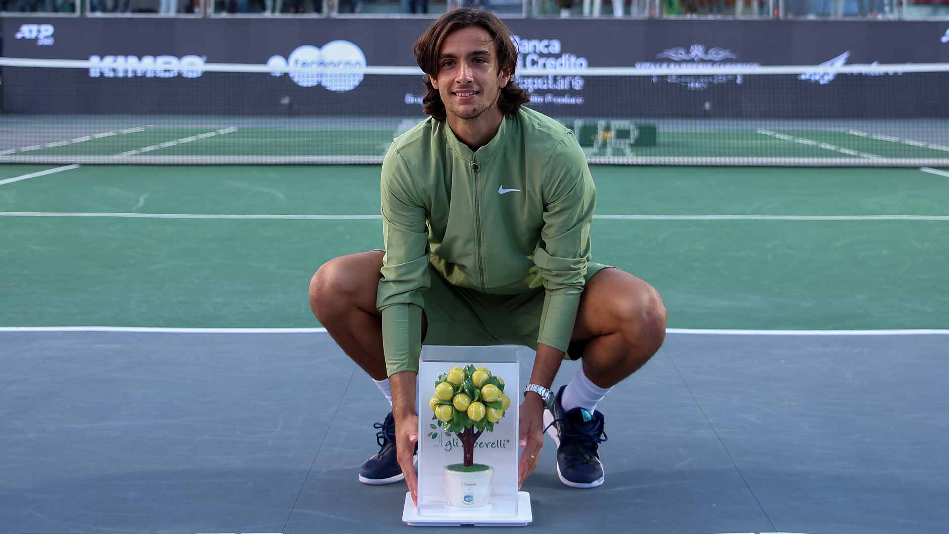 Lorenzo Musetti celebrates winning his second ATP Tour title on Sunday in Naples.