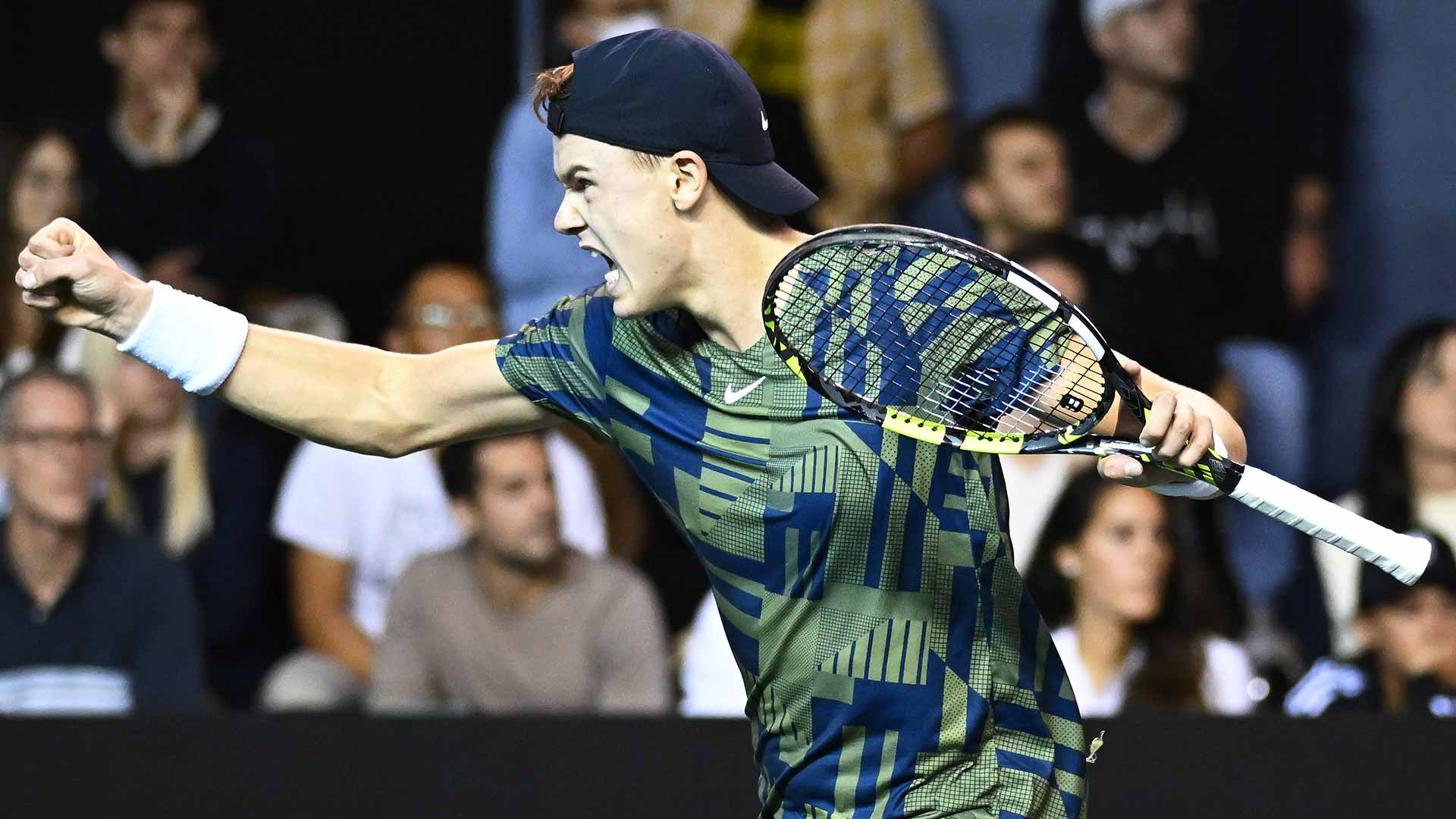 Holger Rune edges Stan Wawrinka in a third-set tie-break to set a second-round showdown with Hubert Hurkacz in Paris.