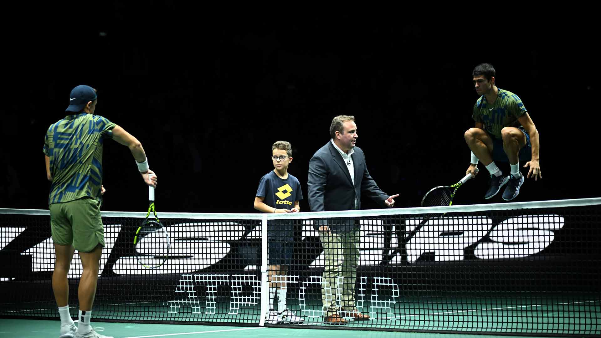 Holger Rune (left) and Carlos Alcaraz at the coin toss ahead of Friday's quarter-final.