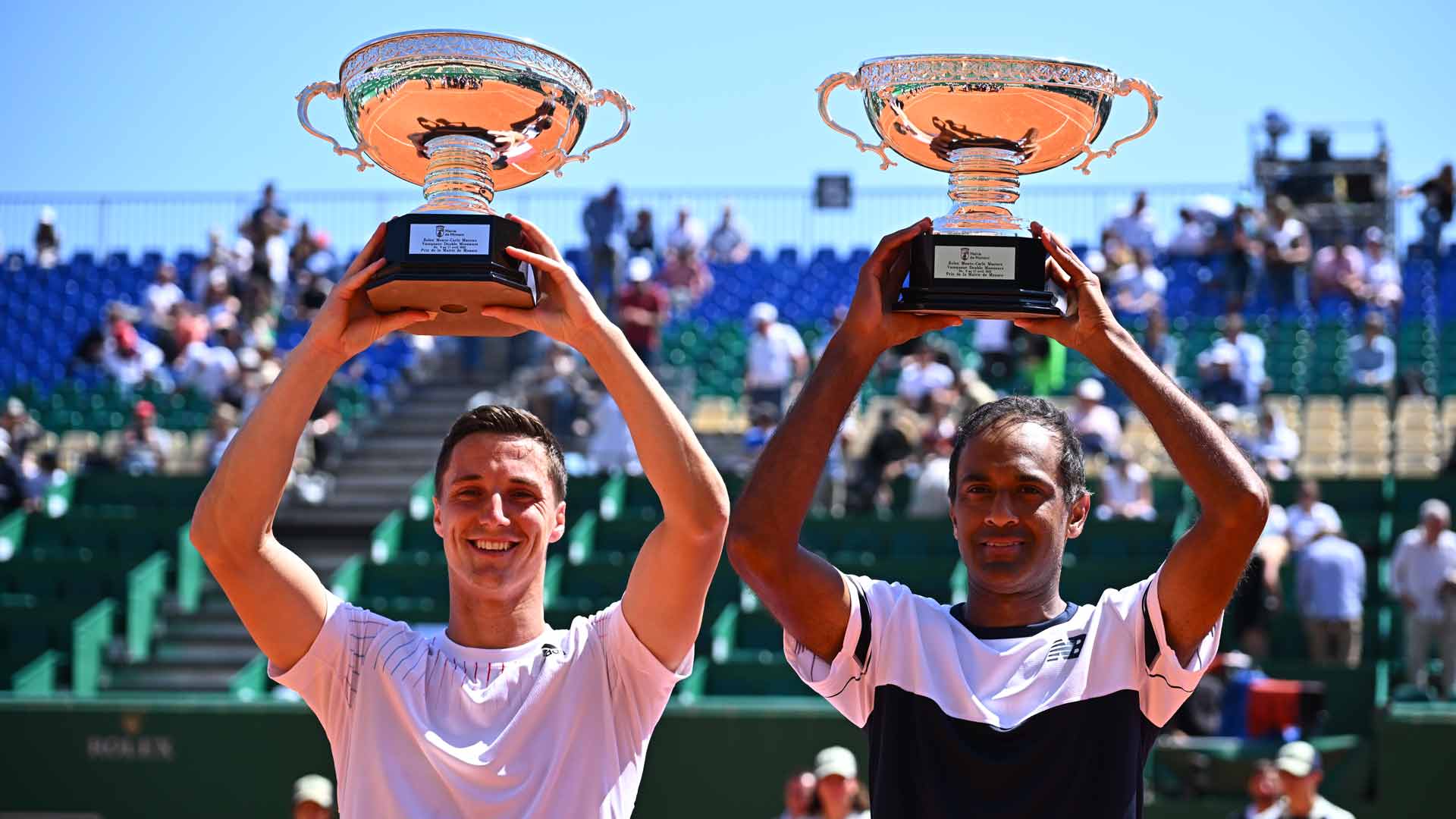 <a href='https://www.atptour.com/en/players/joe-salisbury/so70/overview'>Joe Salisbury</a> (left) and <a href='https://www.atptour.com/en/players/rajeev-ram/r548/overview'>Rajeev Ram</a> collect the title in Monte Carlo. 