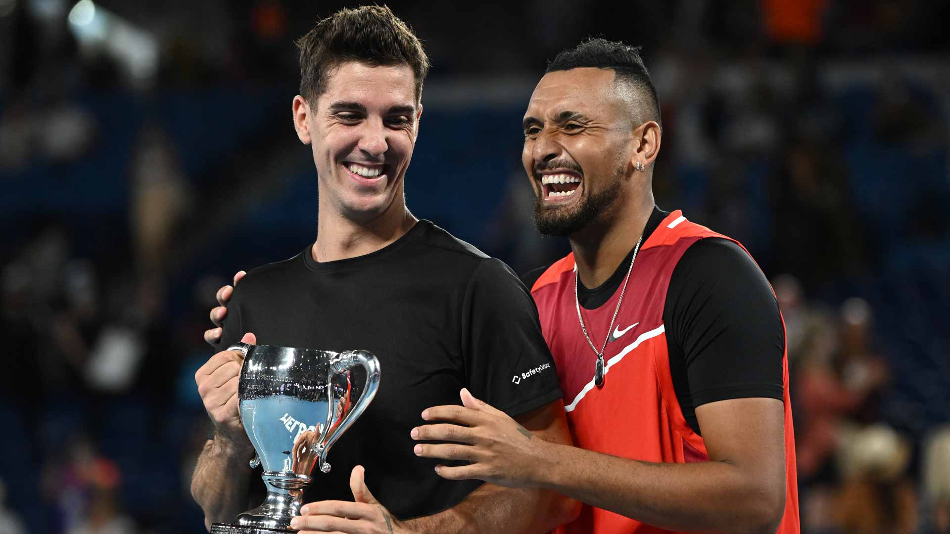 <a href='https://www.atptour.com/en/players/thanasi-kokkinakis/kd46/overview'>Thanasi Kokkinakis</a> (left) and <a href='https://www.atptour.com/en/players/nick-kyrgios/ke17/overview'>Nick Kyrgios</a> celebrate winning the <a href='https://www.atptour.com/en/tournaments/australian-open/580/overview'>Australian Open</a> title.
