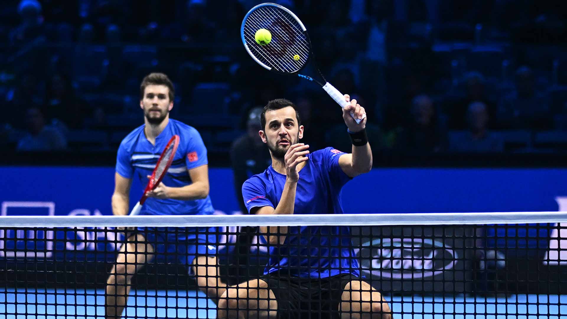 Nikola Mektic and Mate Pavic in action on Saturday in Turin.