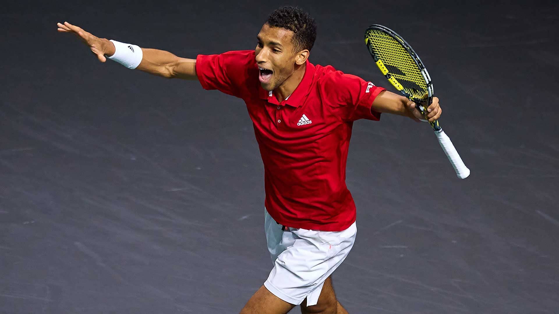 Felix Auger-Aliassime celebrates after helping Canada reach the Davis Cup final on Saturday in Malaga.