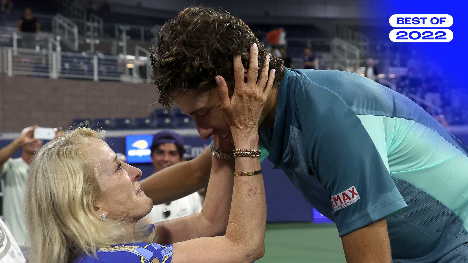 Brandon Holt shares an embrace with his mother, two-time US Open singles champ Tracy Austin, after his upset win against Taylor Fritz in New York.