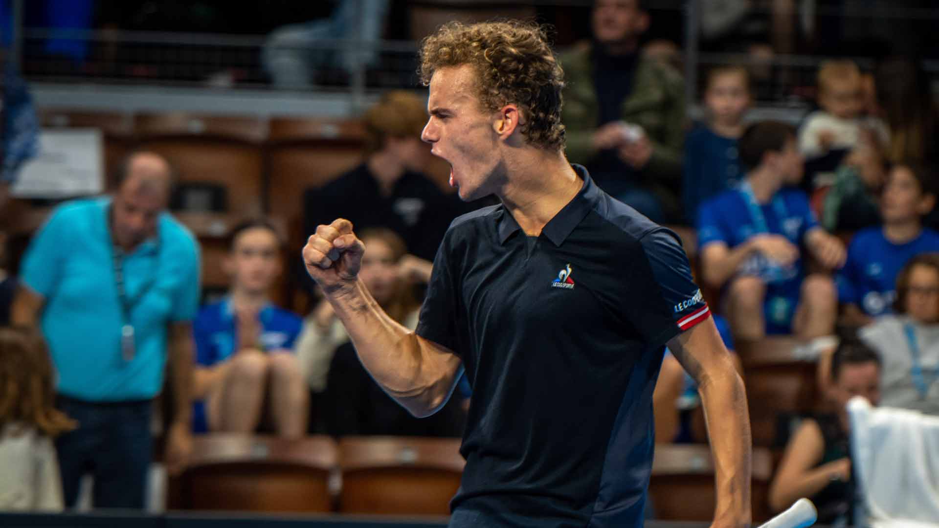 <a href='https://www.atptour.com/en/players/luca-van-assche/v0dz/overview'>Luca Van Assche</a> celebrates a semi-final win at the 2022 Brest Challenger.