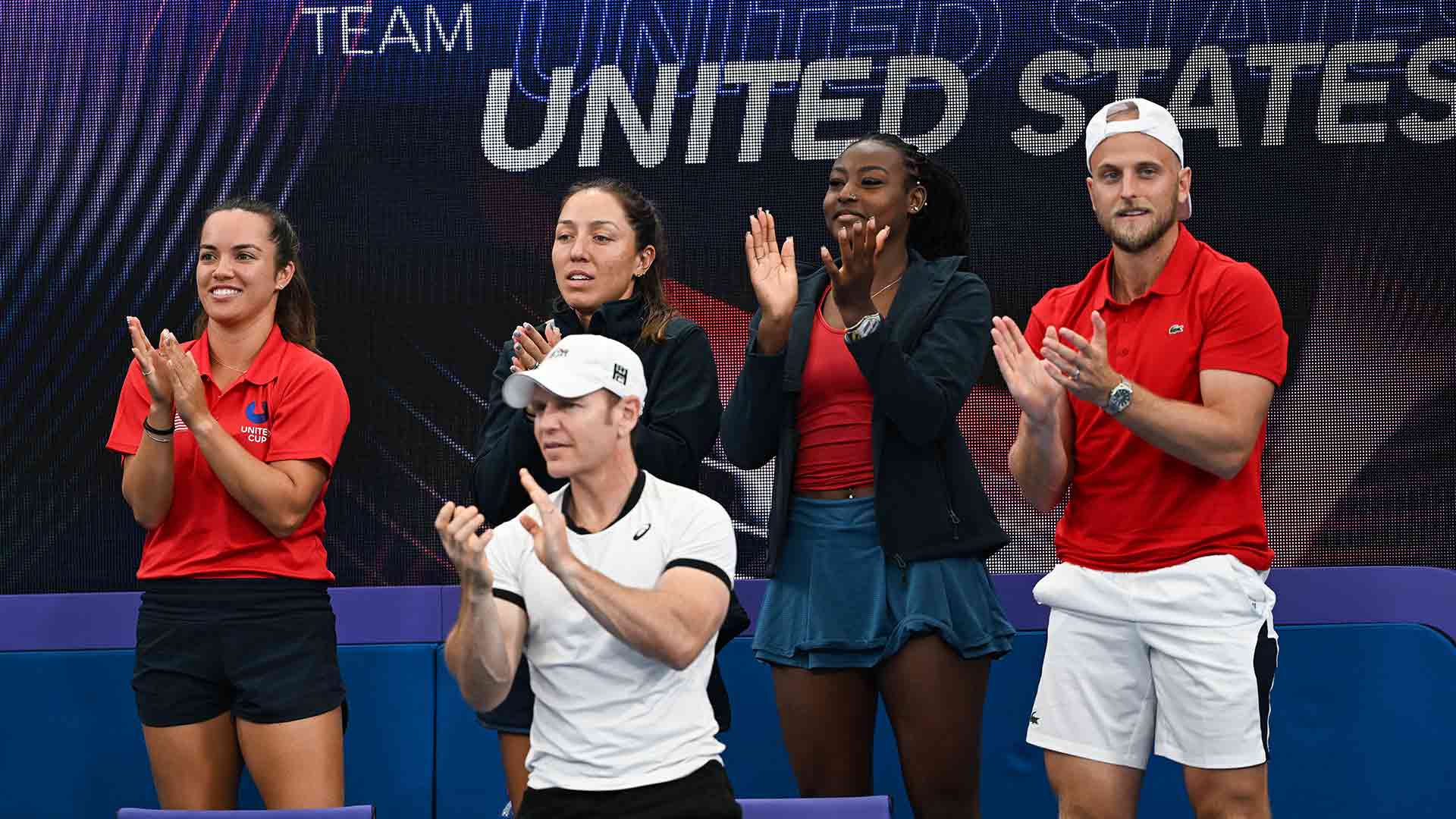 Team United States cheer on Taylor Fritz.
