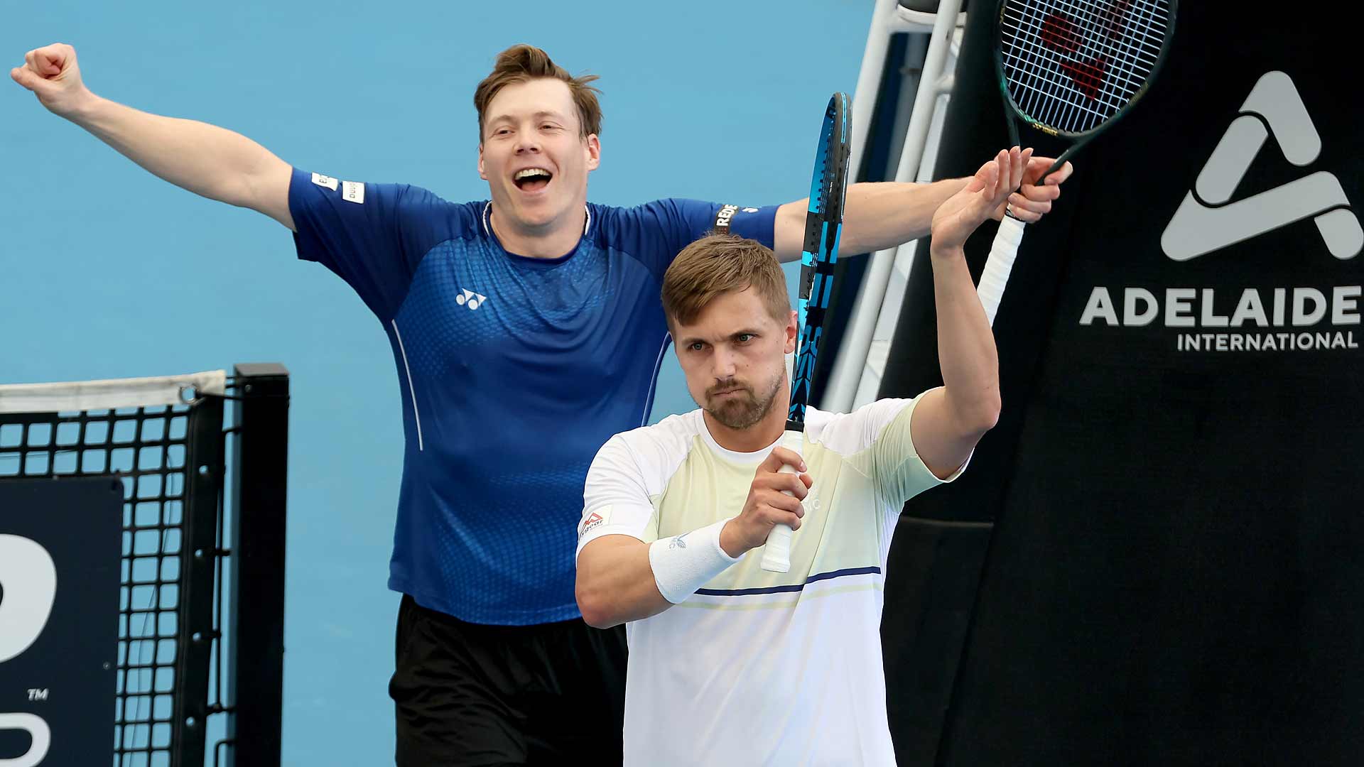 Harri Heliovaara and Lloyd Glasspool celebrate their victory on Sunday at the Adelaide International 1.