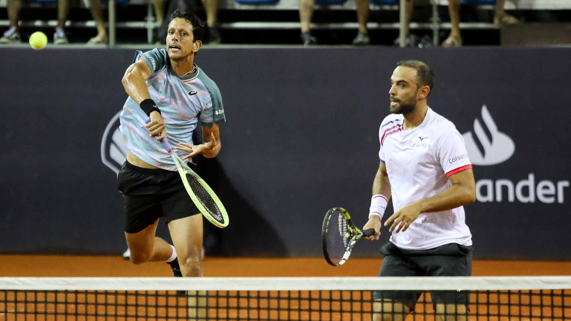 Marcelo Melo and Juan Sebastian Cabal win their Rio quarter-final match without facing a break point.