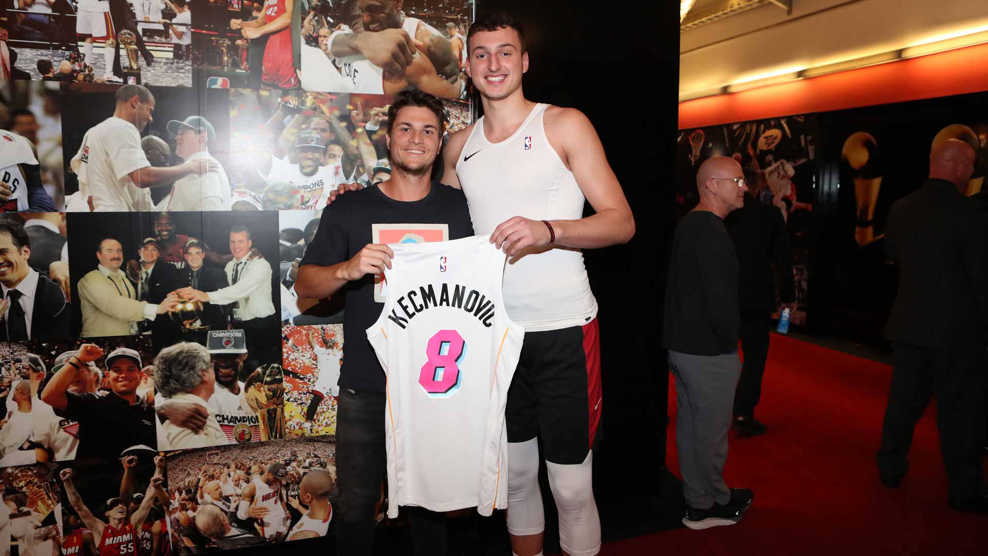 <a href='https://www.atptour.com/en/players/miomir-kecmanovic/ki95/overview'>Miomir Kecmanovic</a> meets fellow Serbian Nikola Jovic of the Miami Heat.
