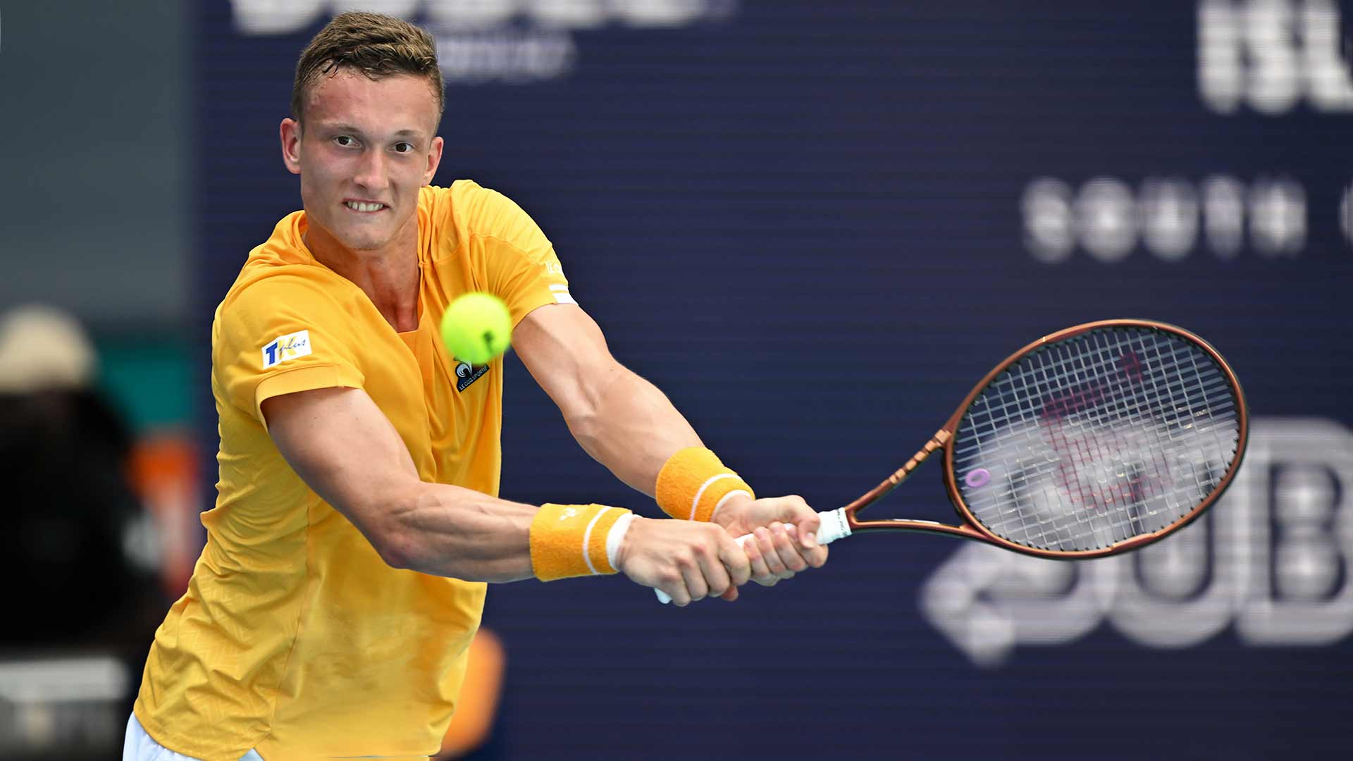 Jiri Lehecka powers a backhand against Lorenzo Musetti on Saturday during his second-round win in Miami.