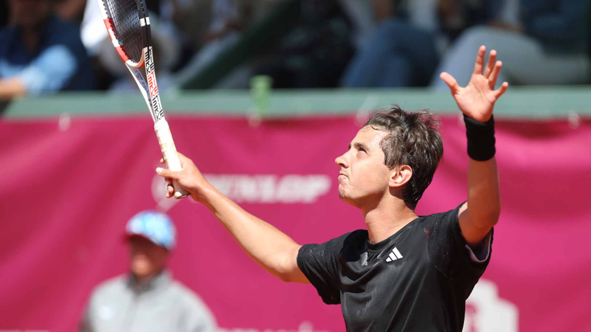 Alexander Shevchenko celebrates winning the Madrid Challenger. 