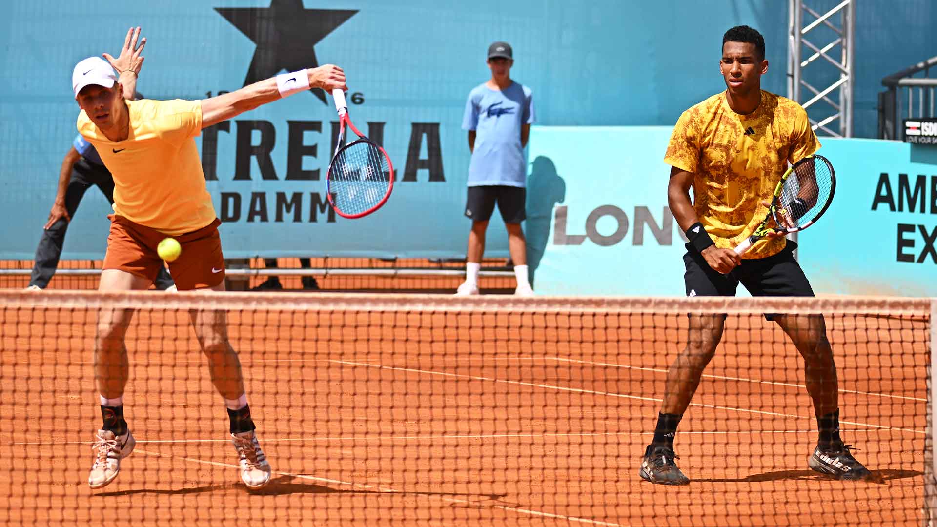Denis Shapovalov and Felix Auger-Aliassime in action on Friday in Madrid.