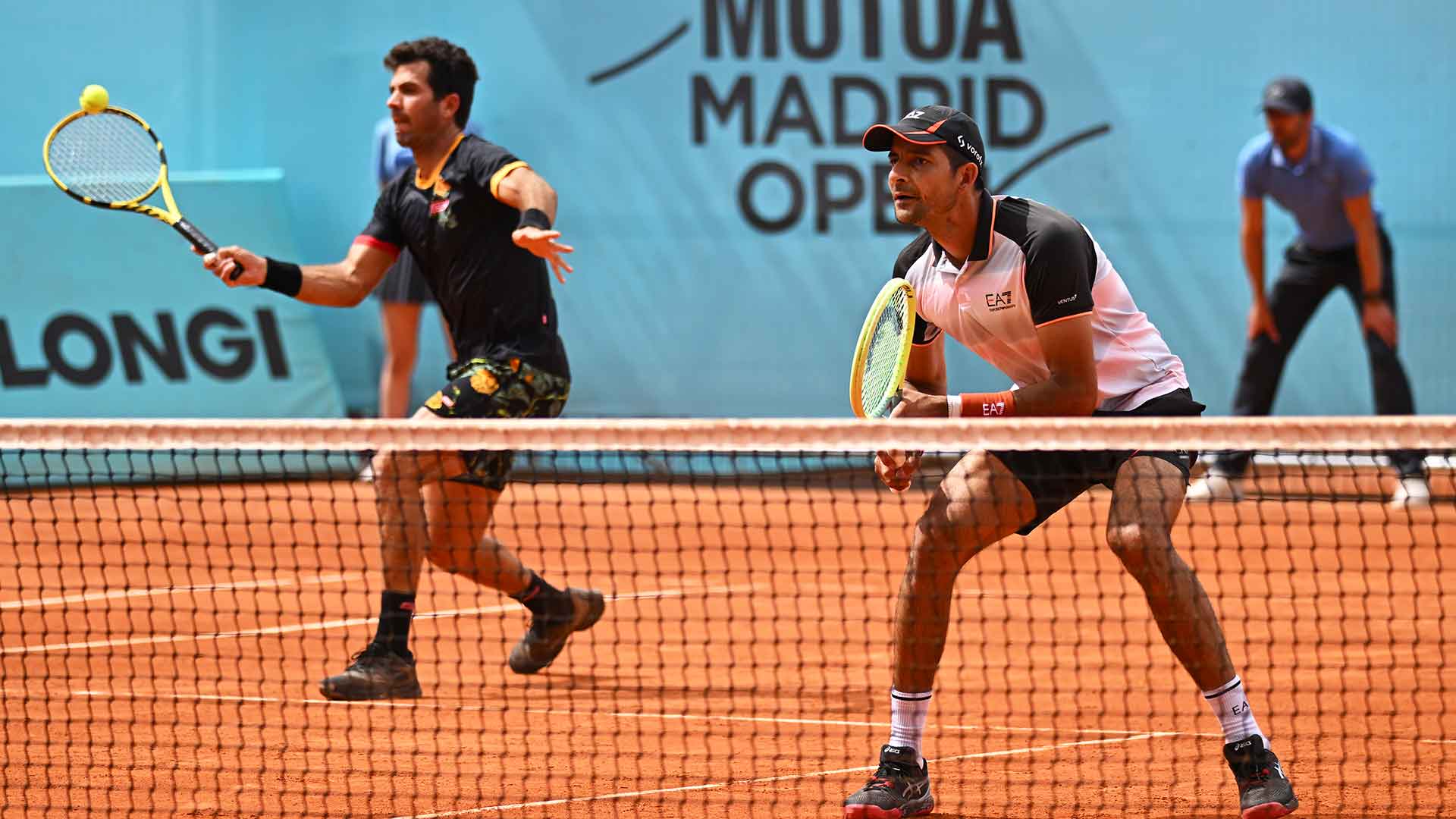 Jean-Julien Rojer and Marcelo Arevalo in action on Sunday in Madrid.