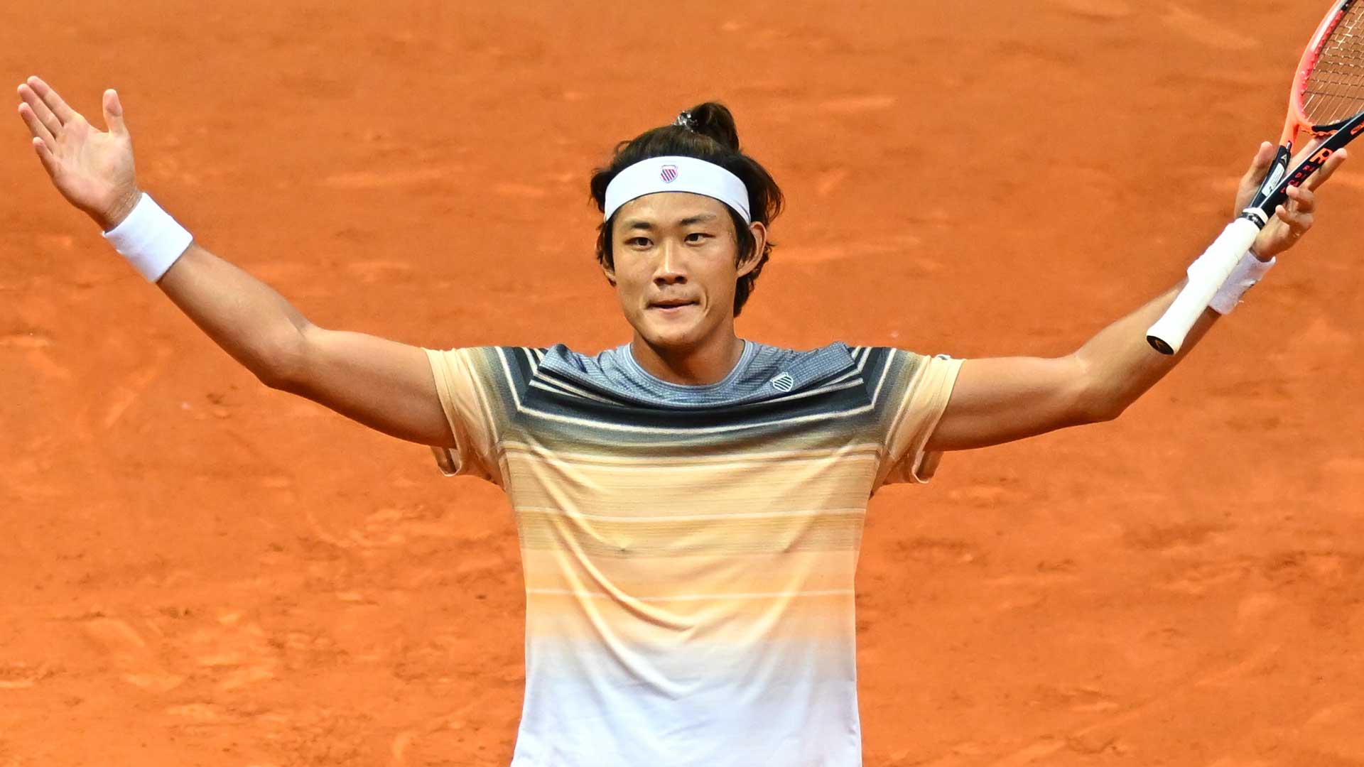 Zhang Zhizhen celebrates his third win in Madrid after extending his dream debut in the Spanish capital.