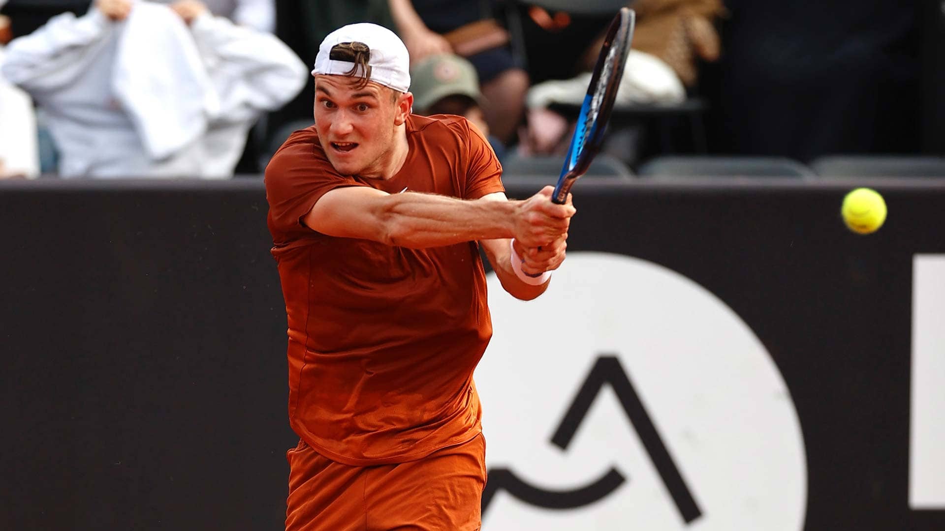Jack Draper powers through a backhand on Sunday in Lyon.