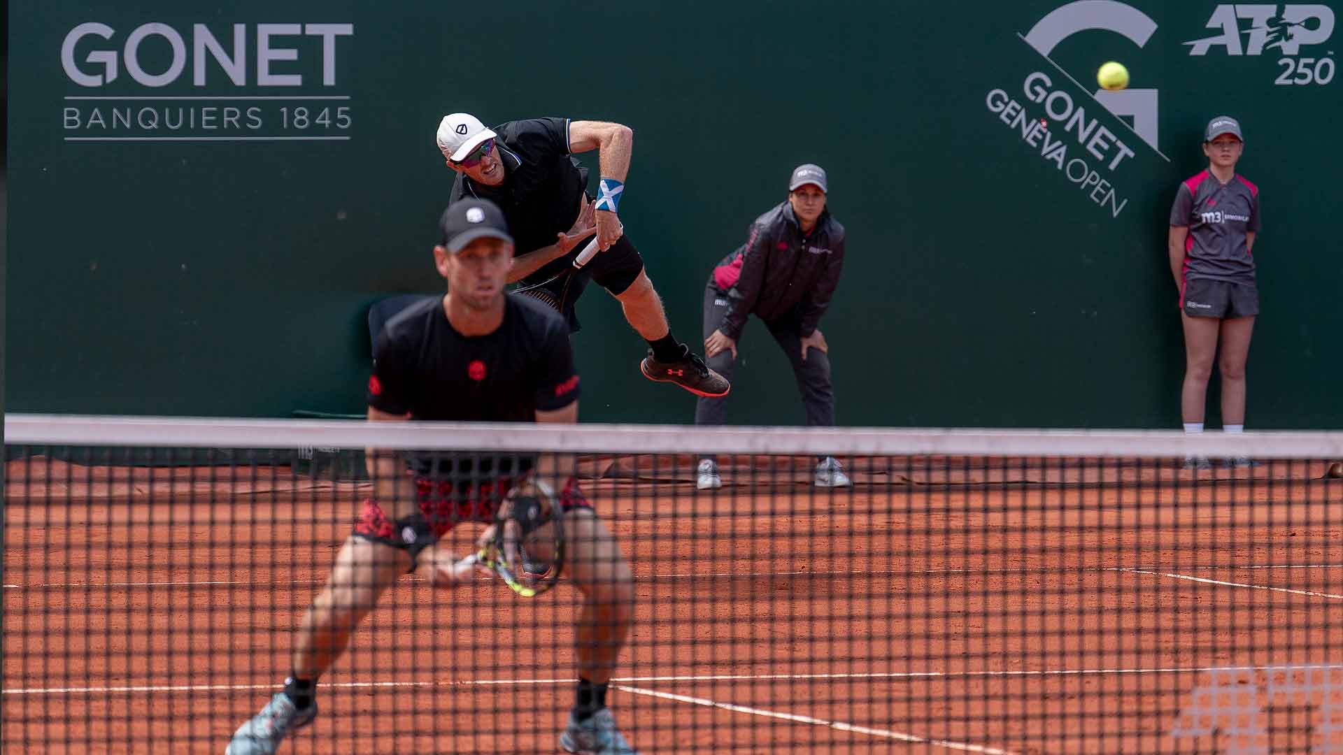 Michael Venus (foreground) and Jamie Murray face just one break point in their semi-final win against Simone Bolelli and Fabrice Martin.