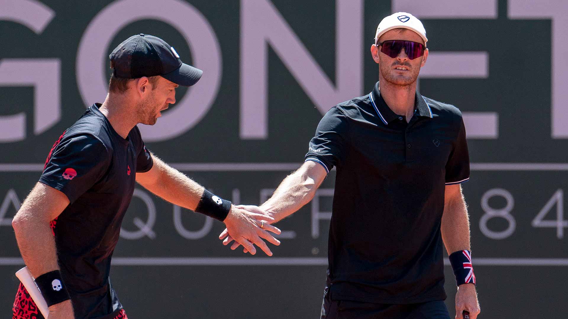 Michael Venus and Jamie Murray in action on Saturday.