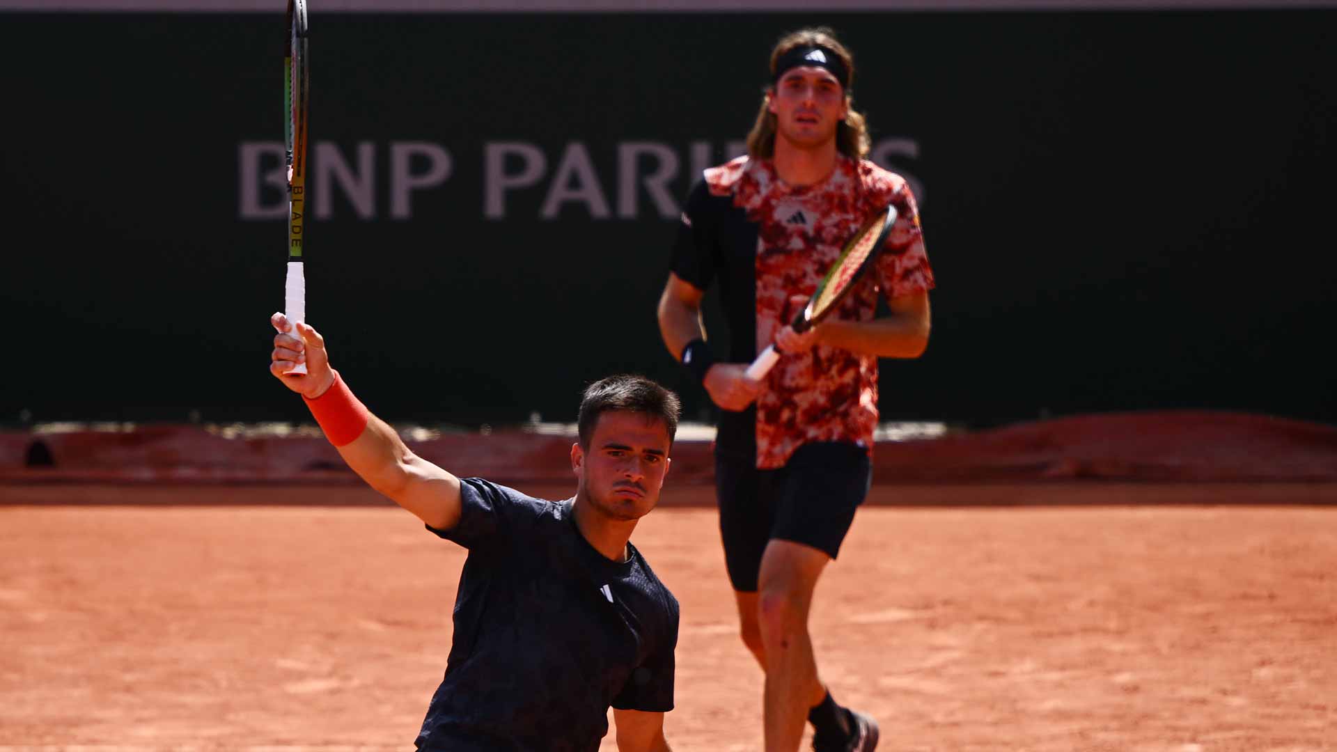 Petros Tsitsipas and Stefanos Tsitsipas during Tuesday's doubles action in Paris.