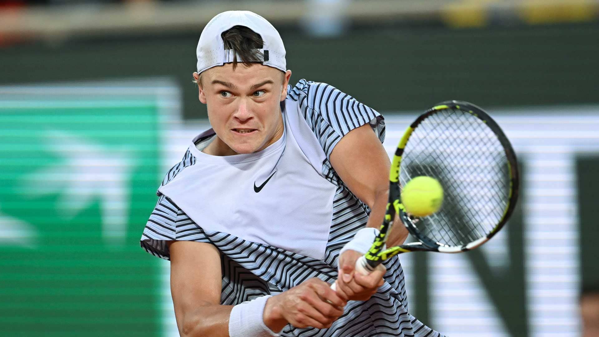Holger Rune exits Roland Garros in the quarter-finals for the second straight year.