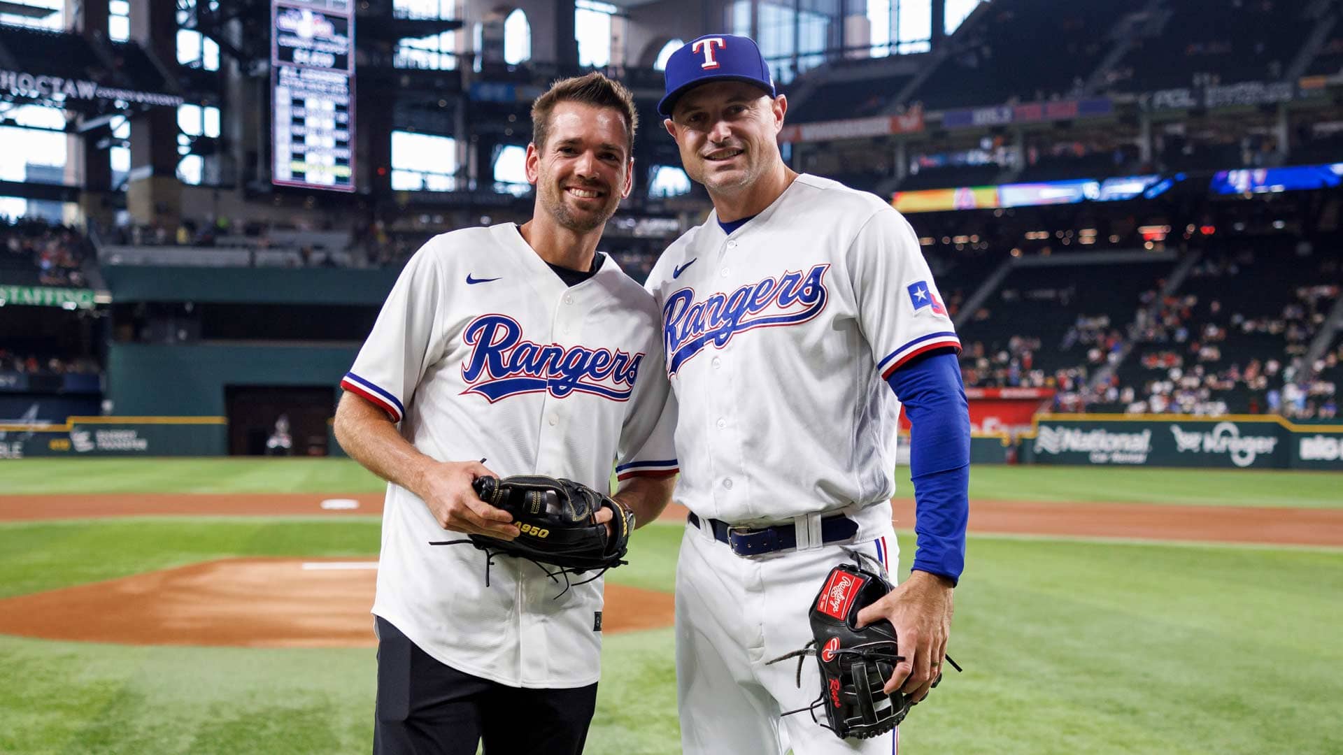 Austin Krajicek poses with Texas Rangers first-base coach Corey Ragsdale.
