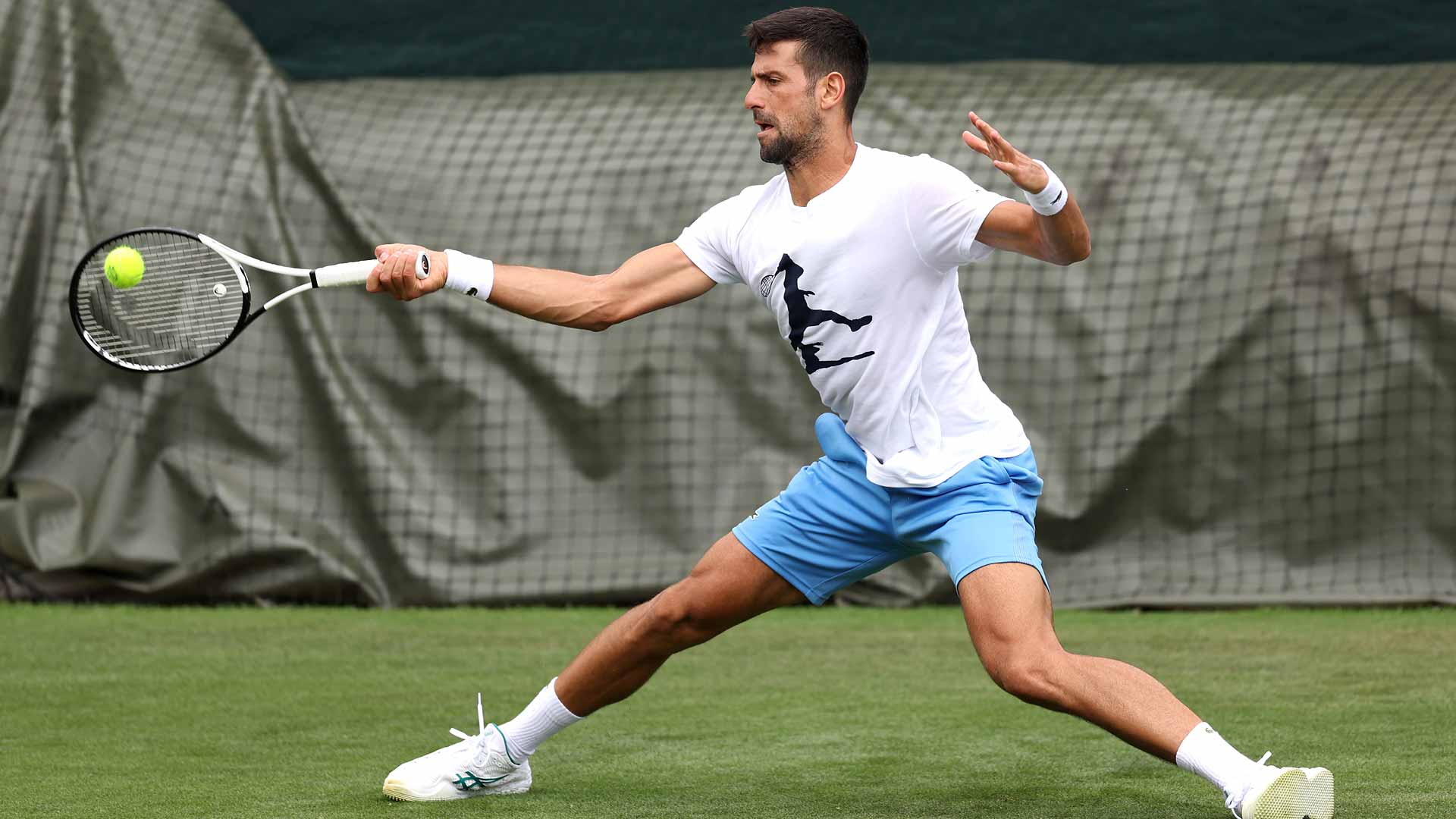 Novak Djokovic, practising Tuesday at Wimbledon, owns an 86-10 record at the grass-court major.