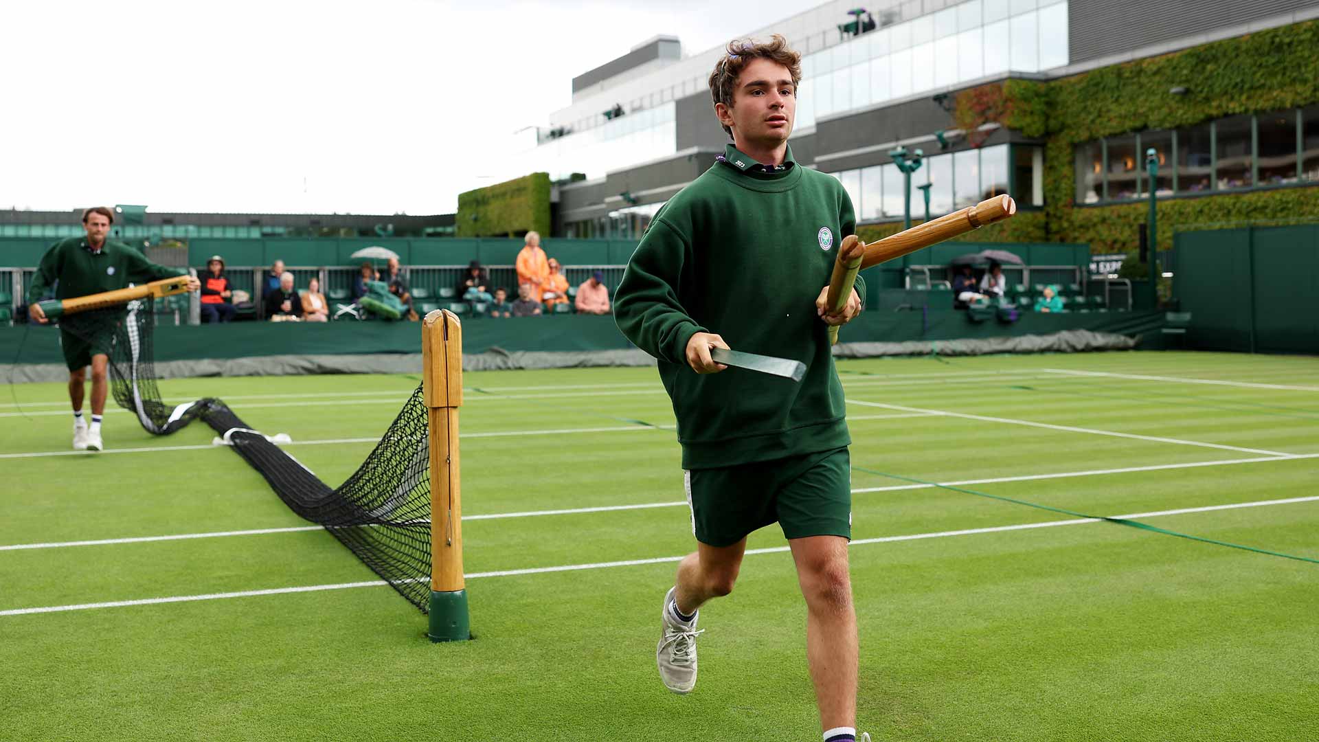 Rain has delayed play at Wimbledon on Wednesday, when 87 matches are scheduled to be completed across the men's and women's singles draws.