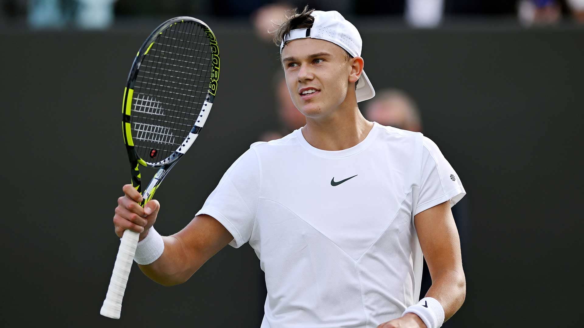 Holger Rune celebrates after striking 34 winners en route to victory against George Loffhagen on Wednesday at Wimbledon.