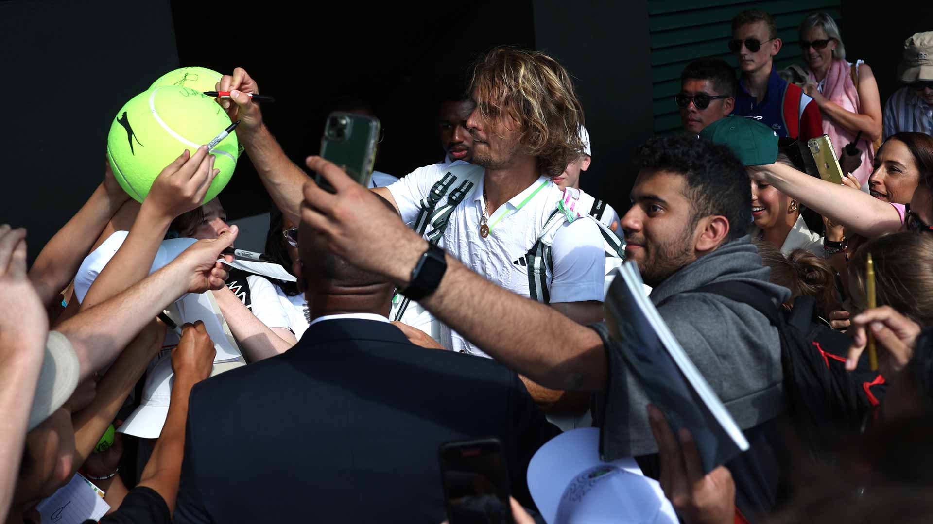 Alexander Zverev greets fans following Friday's win at Wimbledon.