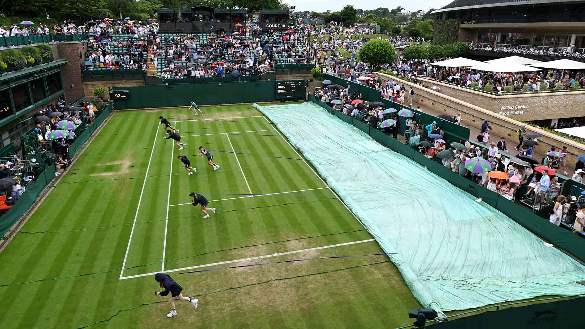 Play has resumed at Wimbledon following rain delay.