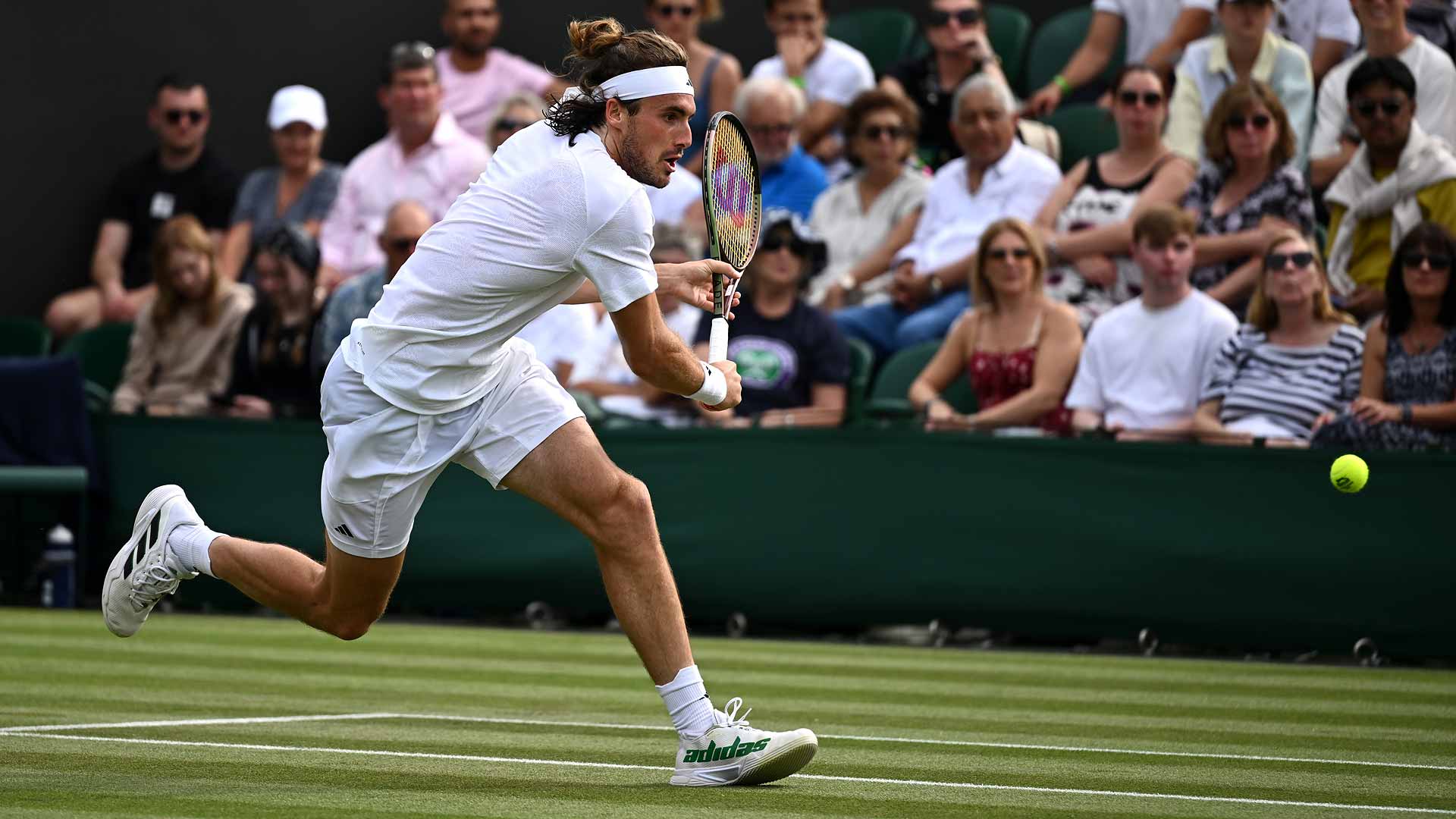 Stefanos Tsitsipas in third-round action against Laslo Djere on Saturday at Wimbledon.