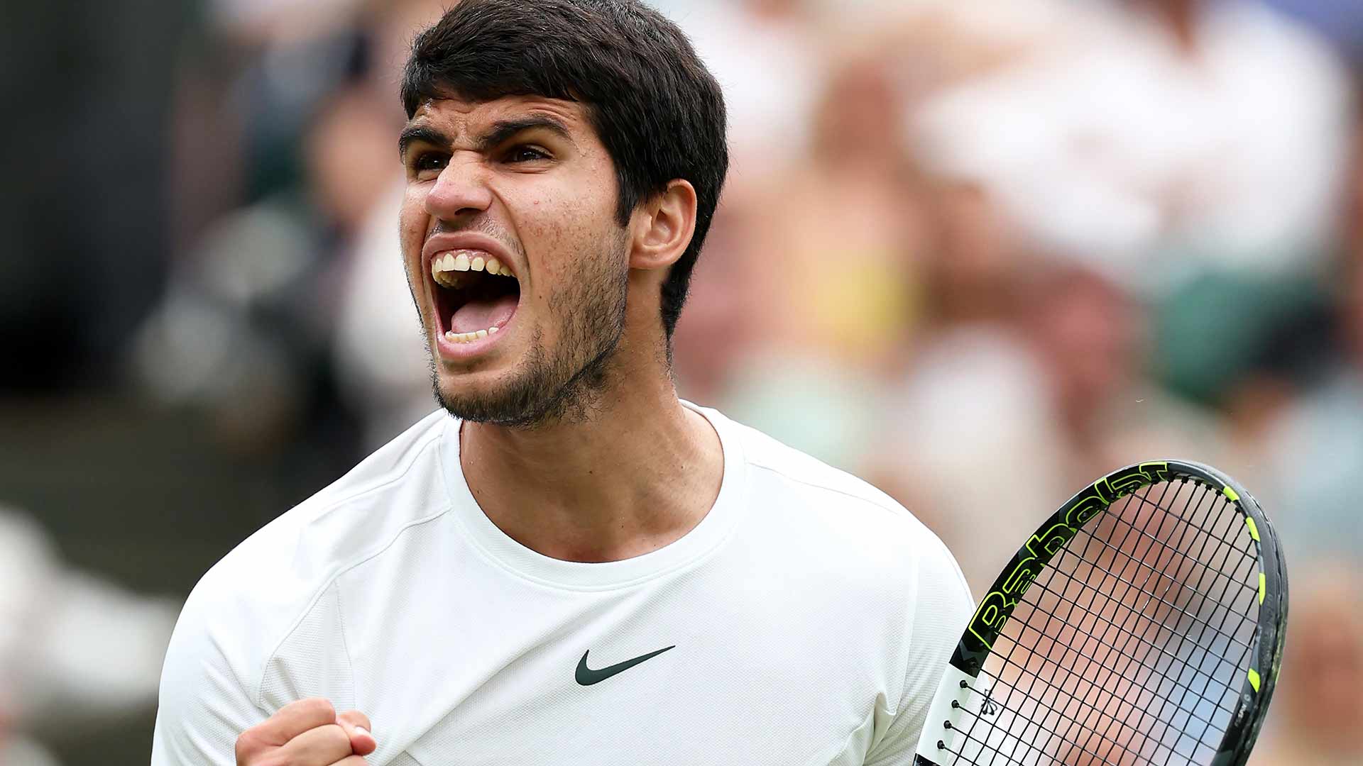 Carlos Alcaraz celebrates his four-set victory over Nicolas Jarry.