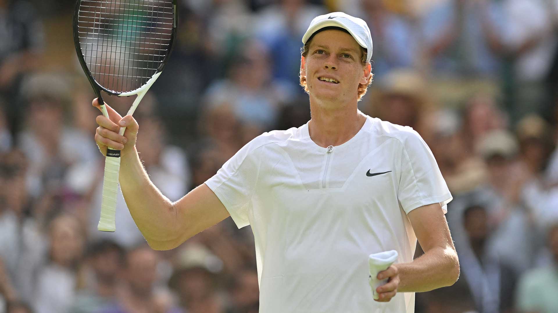 Jannik Sinner celebrates reaching his fifth major quarter-final on Sunday at Wimbledon.