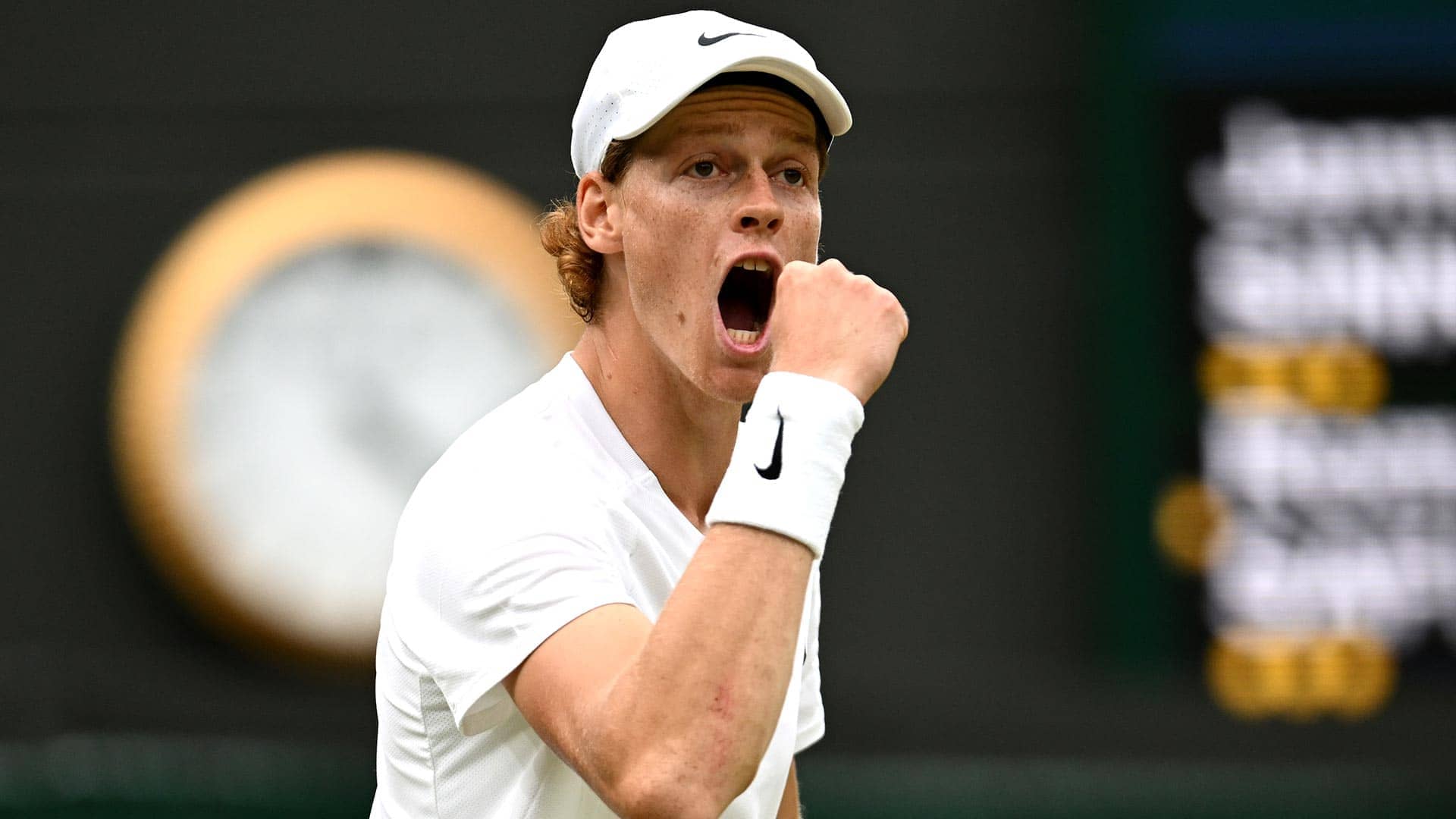 Jannik Sinner celebrates on Tuesday at Wimbledon.