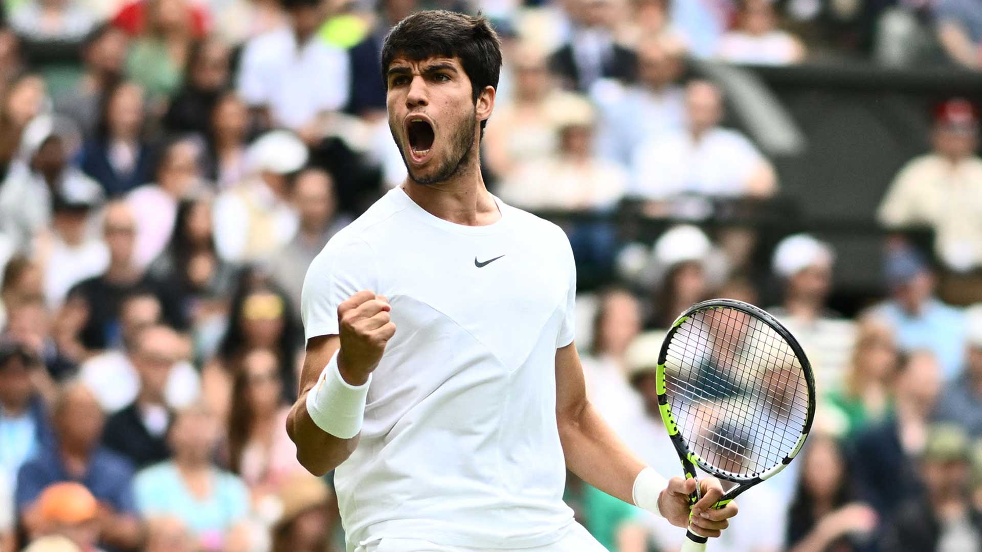 Carlos Alcaraz celebrates against Holger Rune on Wednesday at Wimbledon.