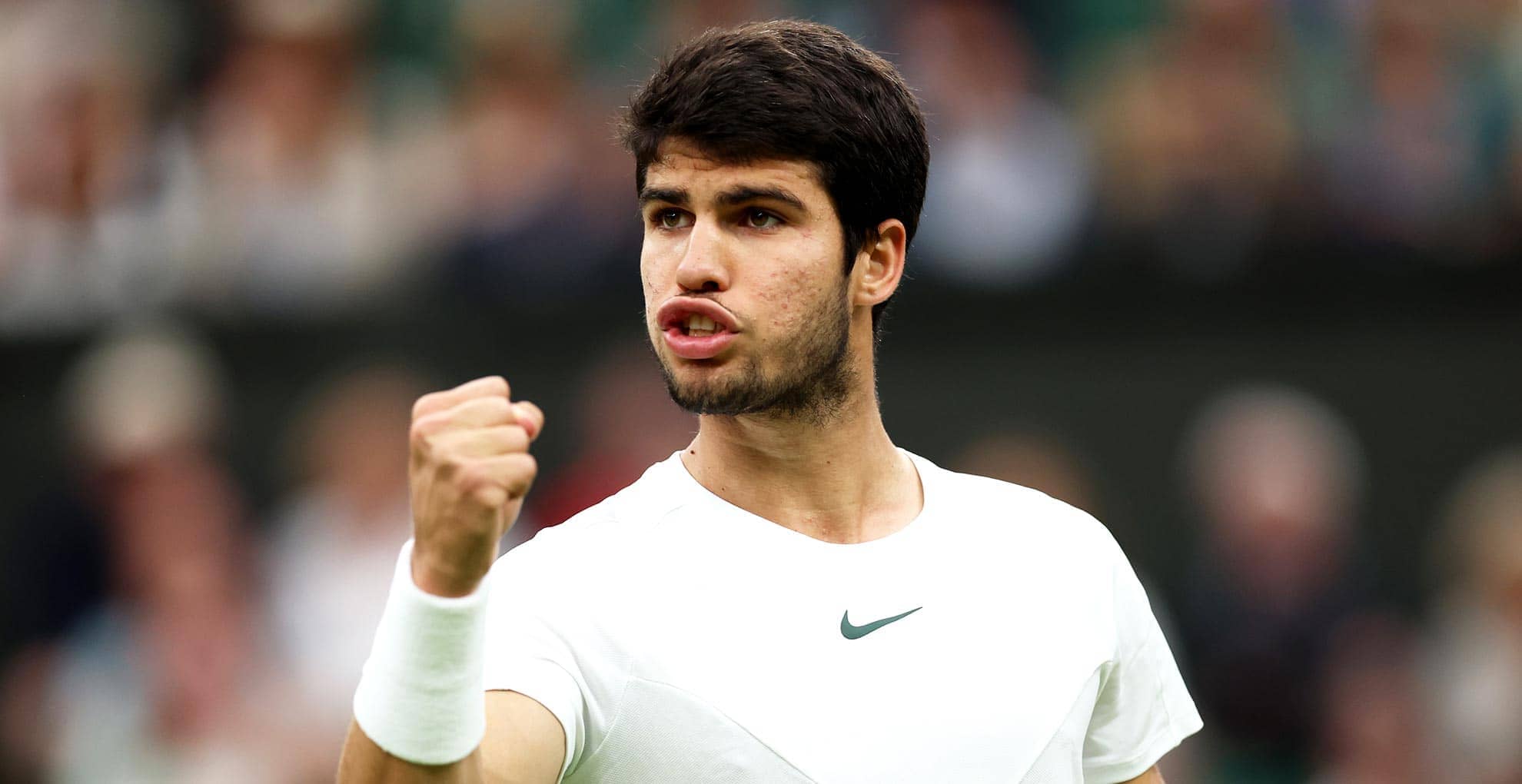 Carlos Alcaraz celebrates against Daniil Medvedev on Friday at Wimbledon.