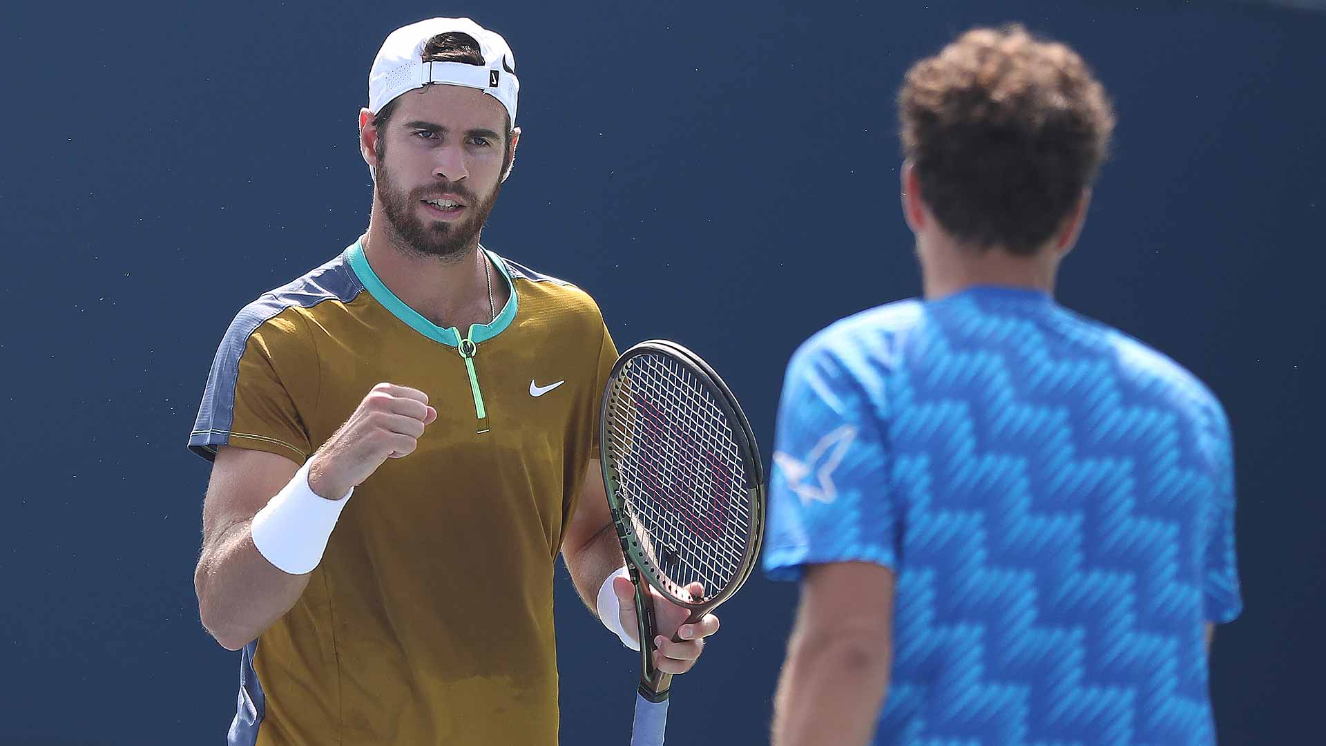 Karen Khachanov plays doubles with Robin Haase in Cincinnati.