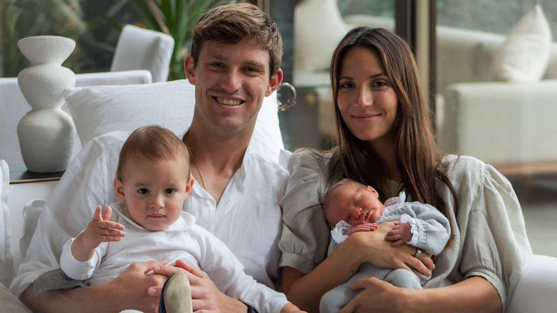 Nicolas Jarry poses with his wife, Laura, and their two sons.