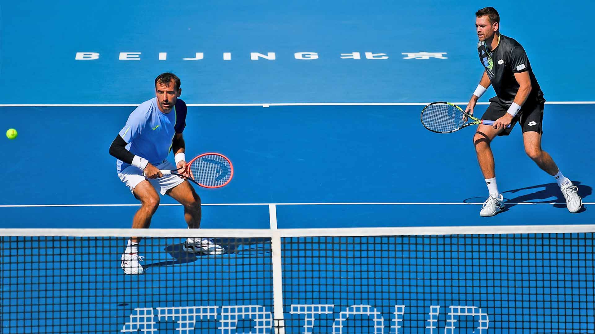 Ivan Dodig and Austin Krajicek advance to the quarter-finals with a straight-sets win on Saturday at the China Open.